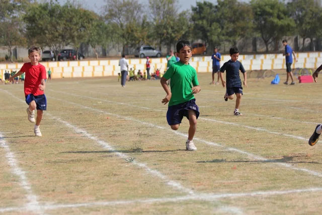 Jay running at a childhood sports day